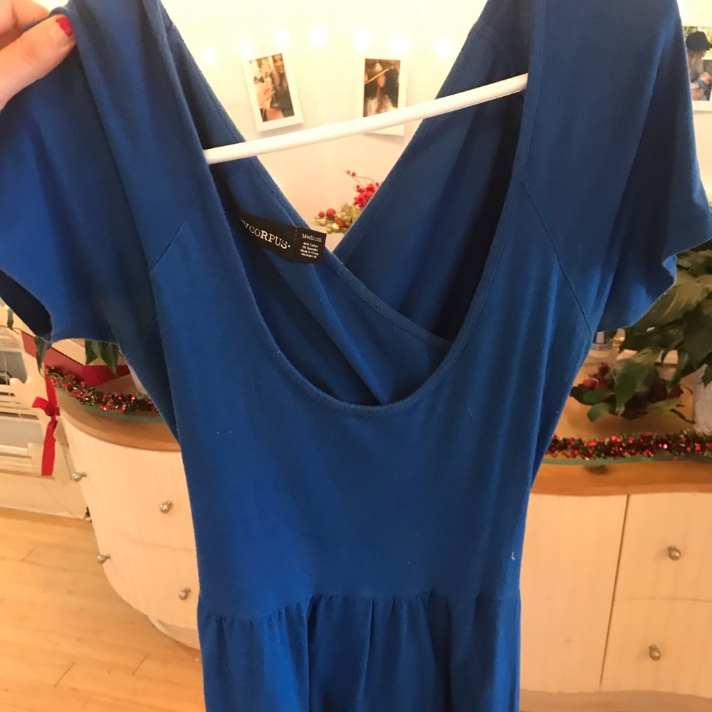 Bycorpus mini dress with cute back detail.